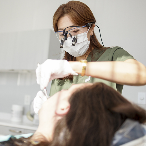 Periodontist treating a patient
