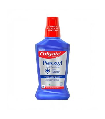 Bottle of blue oral rinse